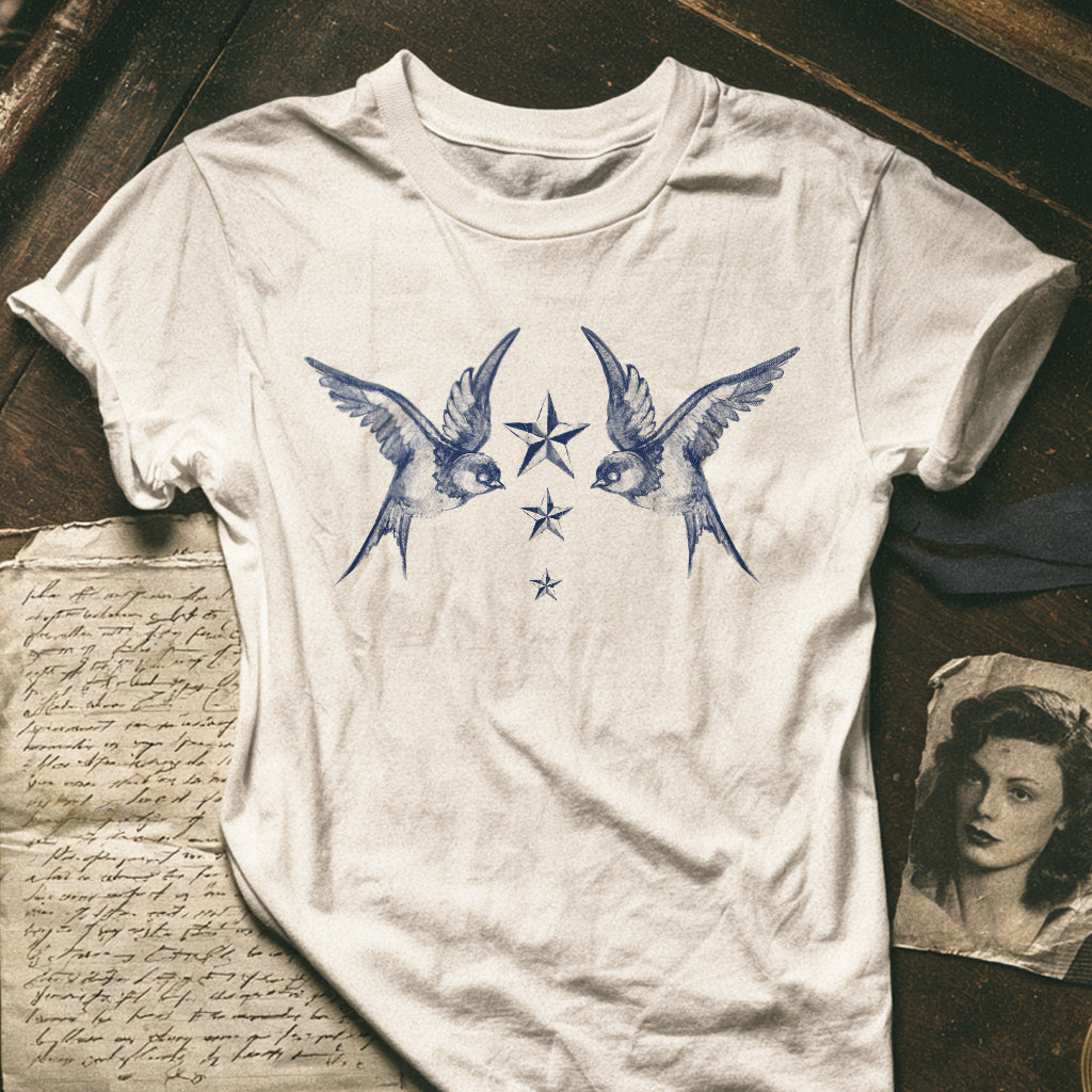 Navy swallow birds design screen printed on a t-shirt