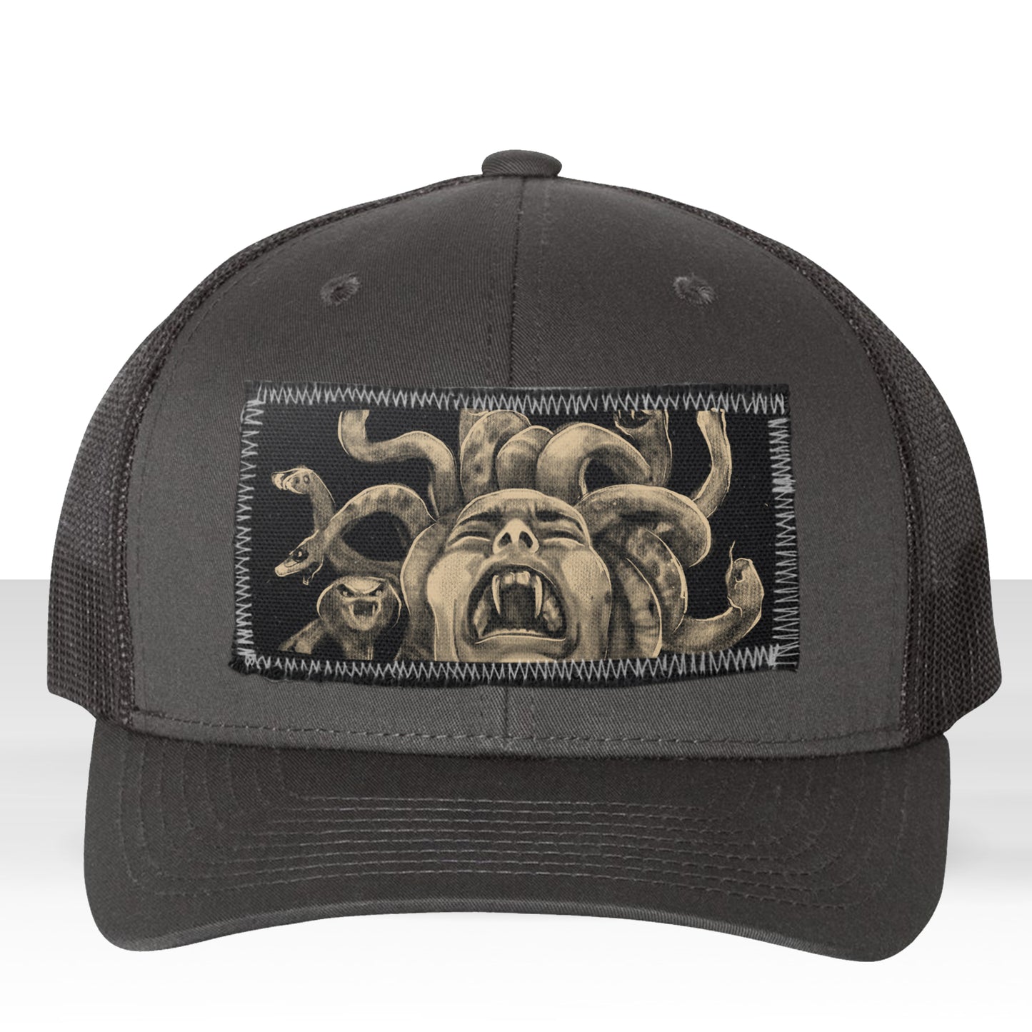 Medusa's Pain: Scream Captured Trucker Hat